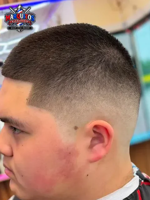 Low fade with a clean line, side view